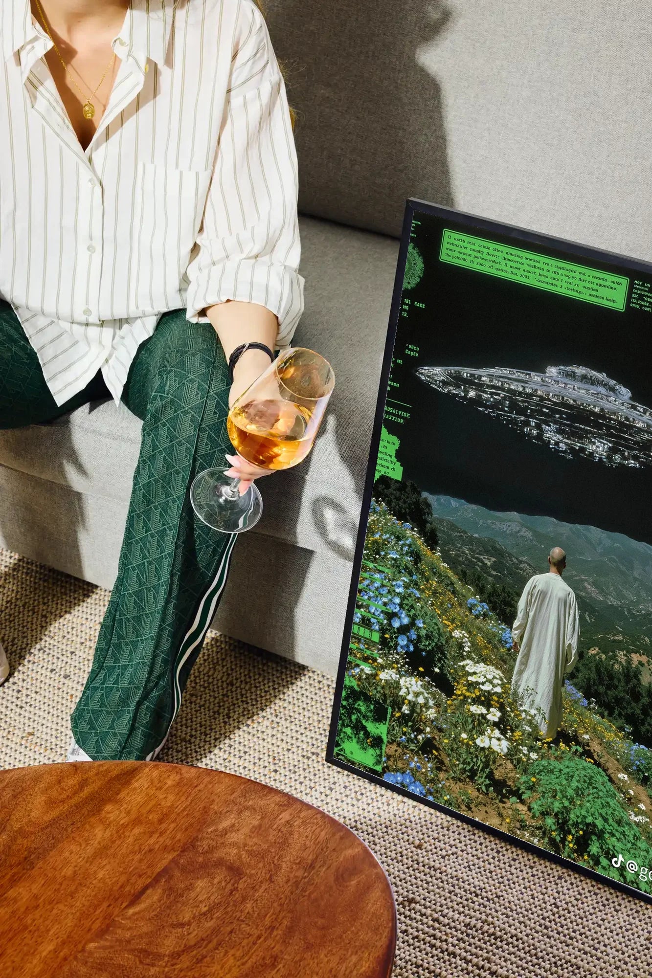 Monk and UFO on Hill - drinkglass-sofa