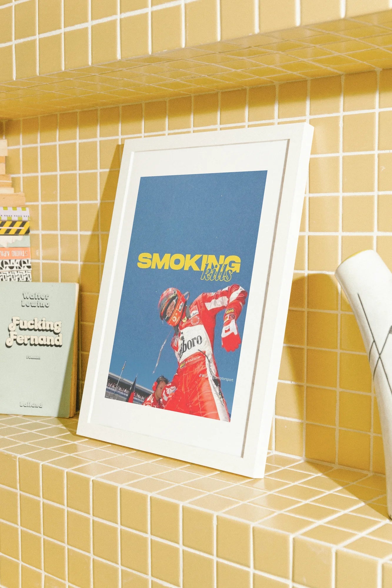 Une photo audacieuse capture un pilote de Formule 1 en rouge éclatant, sur une piste bleue austère avec un texte jaune provocateur défiant les habitudes modernes.. blue, bold, illustration, red, typographic, vibrant, yellow